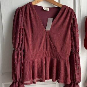 Chic Maroon V-Neck Blouse with Textured Sleeves